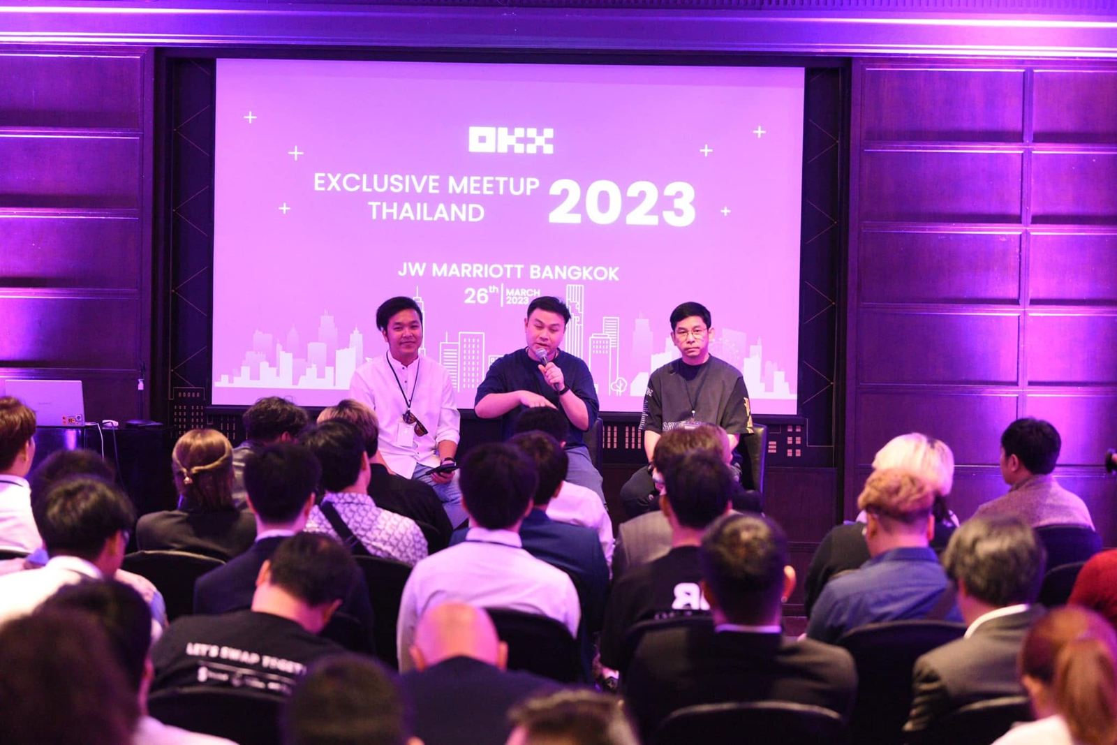 Panel discussion in front of an audience at OKX Exclusive Meetup Thailand 2023, JW Marriott Bangkok
